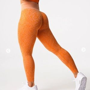 NVGTN Burnt Orange Snakeskin Seamless Leggings